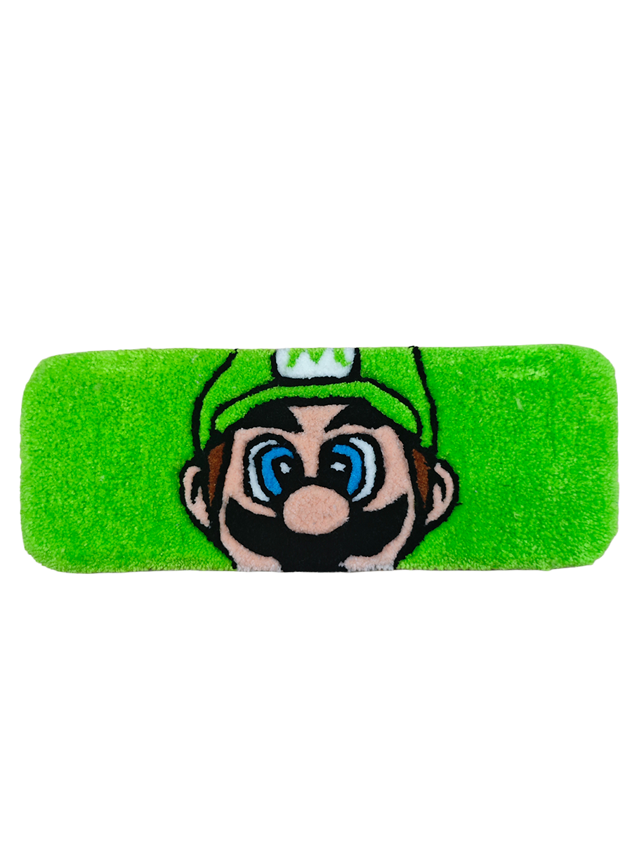 Canlı yeşil zemin üzerine el yapımı tufting tekniğiyle dokunmuş, 3D carving (tıraşlama) yöntemiyle boyutlandırılmış Super Mario figürlü yumuşak dokulu ergonomik klavye pedi bilek desteği.